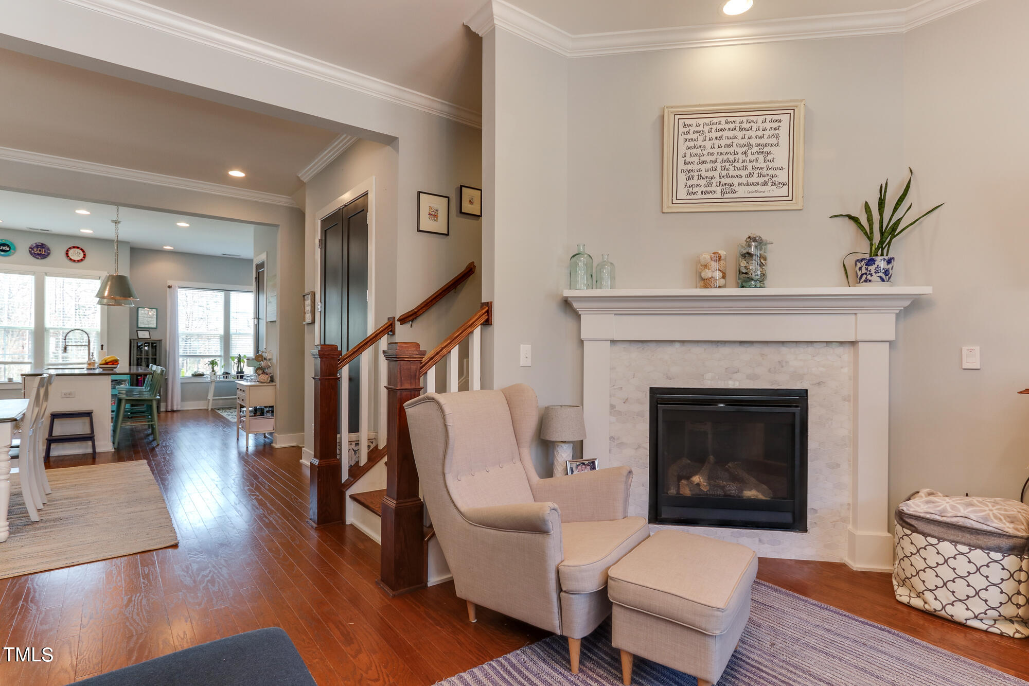 904 Wake Towne Drive Raleigh, NC 27609 - Photo 7 of 30 a living room with furniture and a fireplace