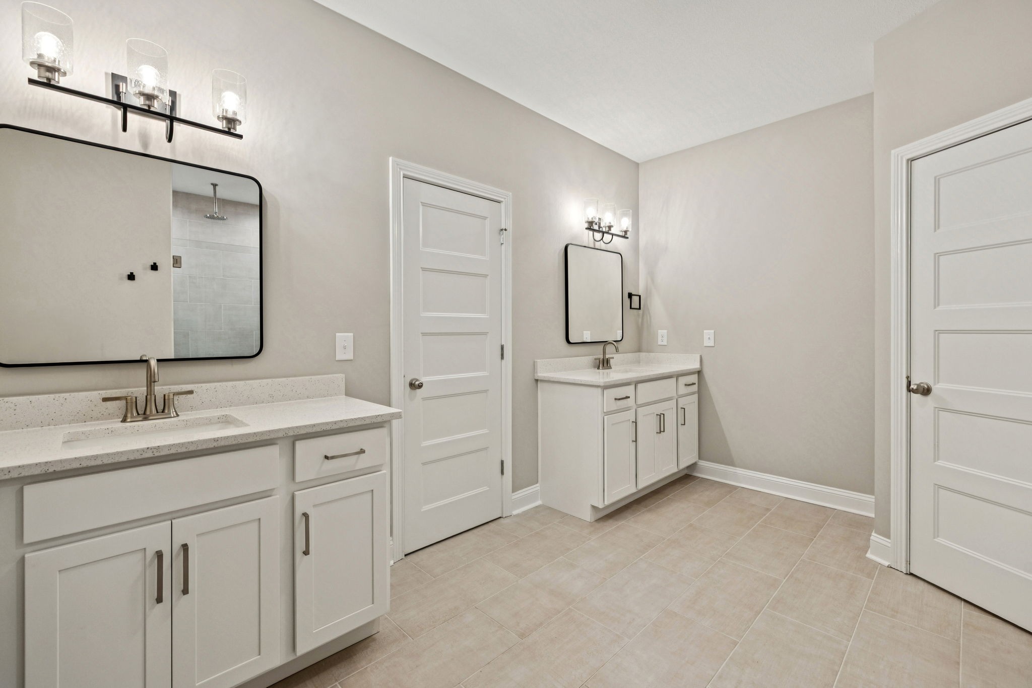 1017 Gholson Road Clarksville, TN 37043 - Photo 22 of 58 a spacious bathroom with a double vanity sink double and mirror