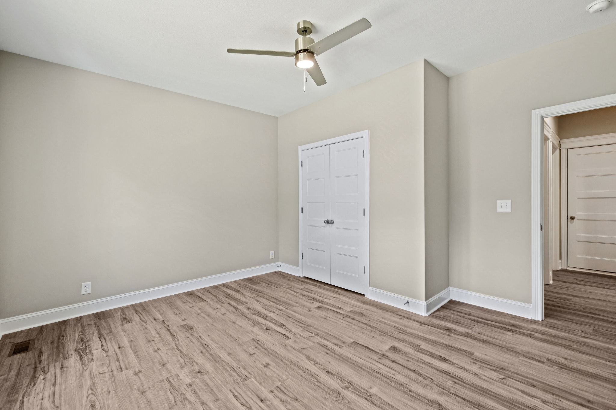 1017 Gholson Road Clarksville, TN 37043 - Photo 27 of 58 wooden floor in an empty room with a window