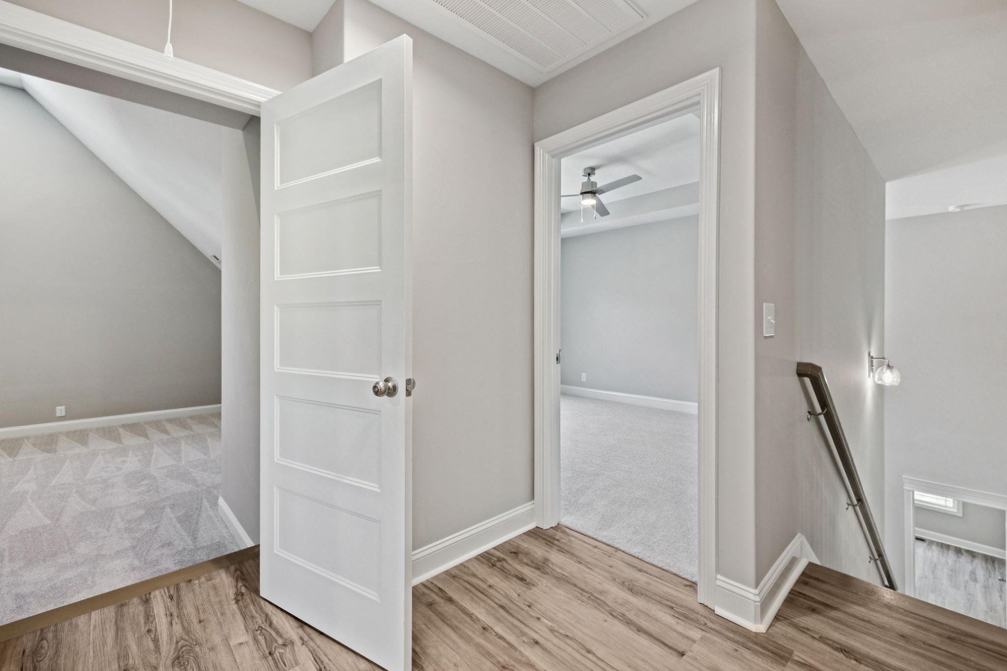 1017 Gholson Road Clarksville, TN 37043 - Photo 33 of 58 a view of a hallway with closet and wooden floor