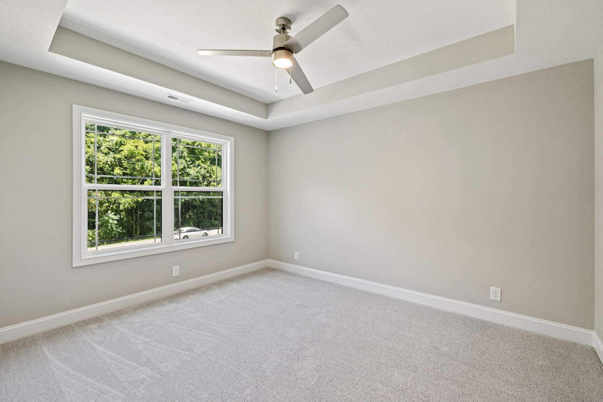 1017 Gholson Road Clarksville, TN 37043 - Photo 34 of 58 an empty room with a window and a ceiling fan