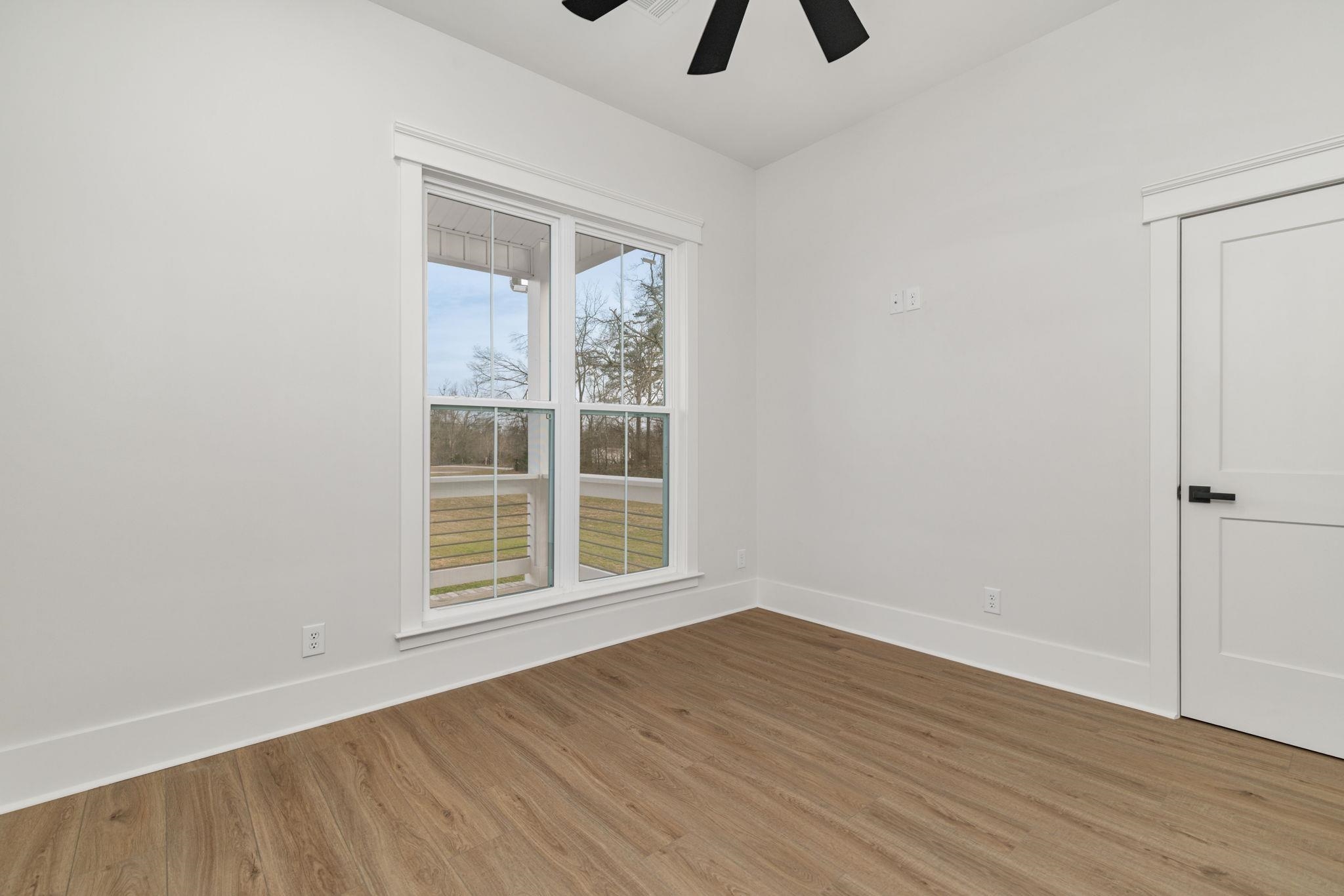 69 County Road 157 Corinth, MS 38834 - Photo 23 of 39 Empty room featuring light wood-type flooring and a ceiling fan