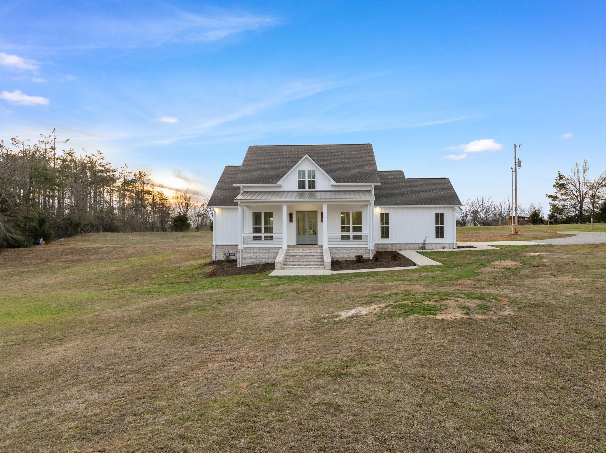 69 County Road 157 Corinth, MS 38834 - Photo 3 of 39 a front view of a house with a yard