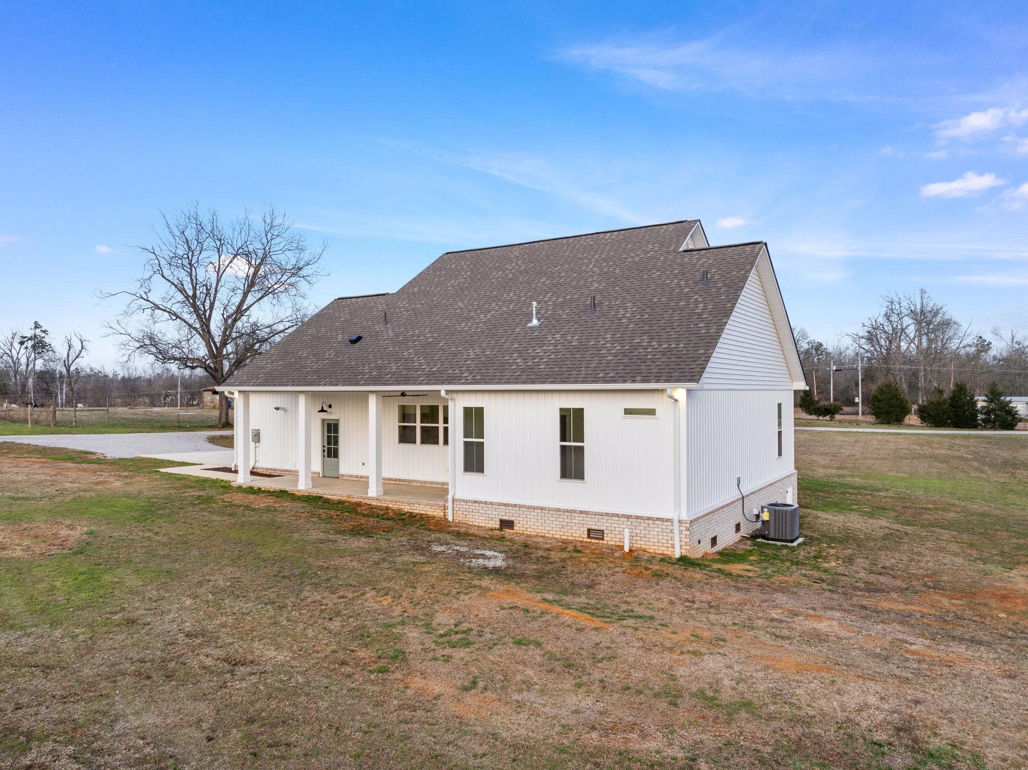 69 County Road 157 Corinth, MS 38834 - Photo 32 of 39 a view of a house with a yard