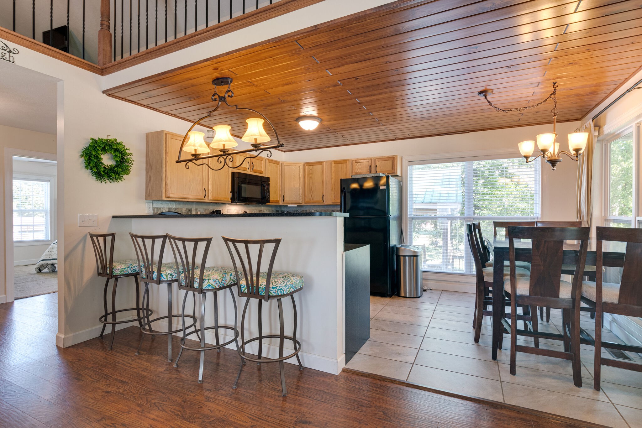 752 Pevahouse Camp Lane Decaturville, TN 38329 - Photo 13 of 47 a view of a dining room with furniture window and wooden floor