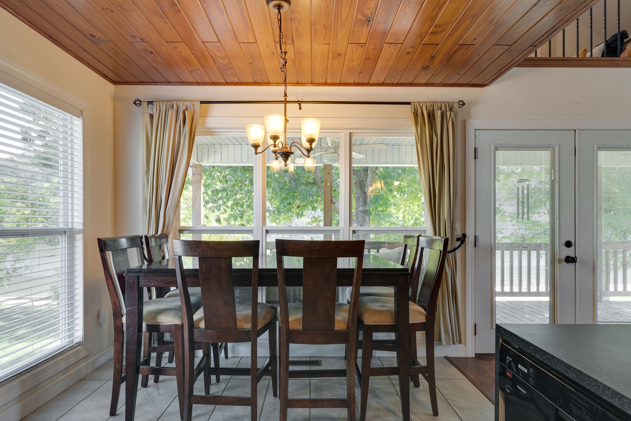 752 Pevahouse Camp Lane Decaturville, TN 38329 - Photo 14 of 47 a view of a dining room with furniture window and outside view