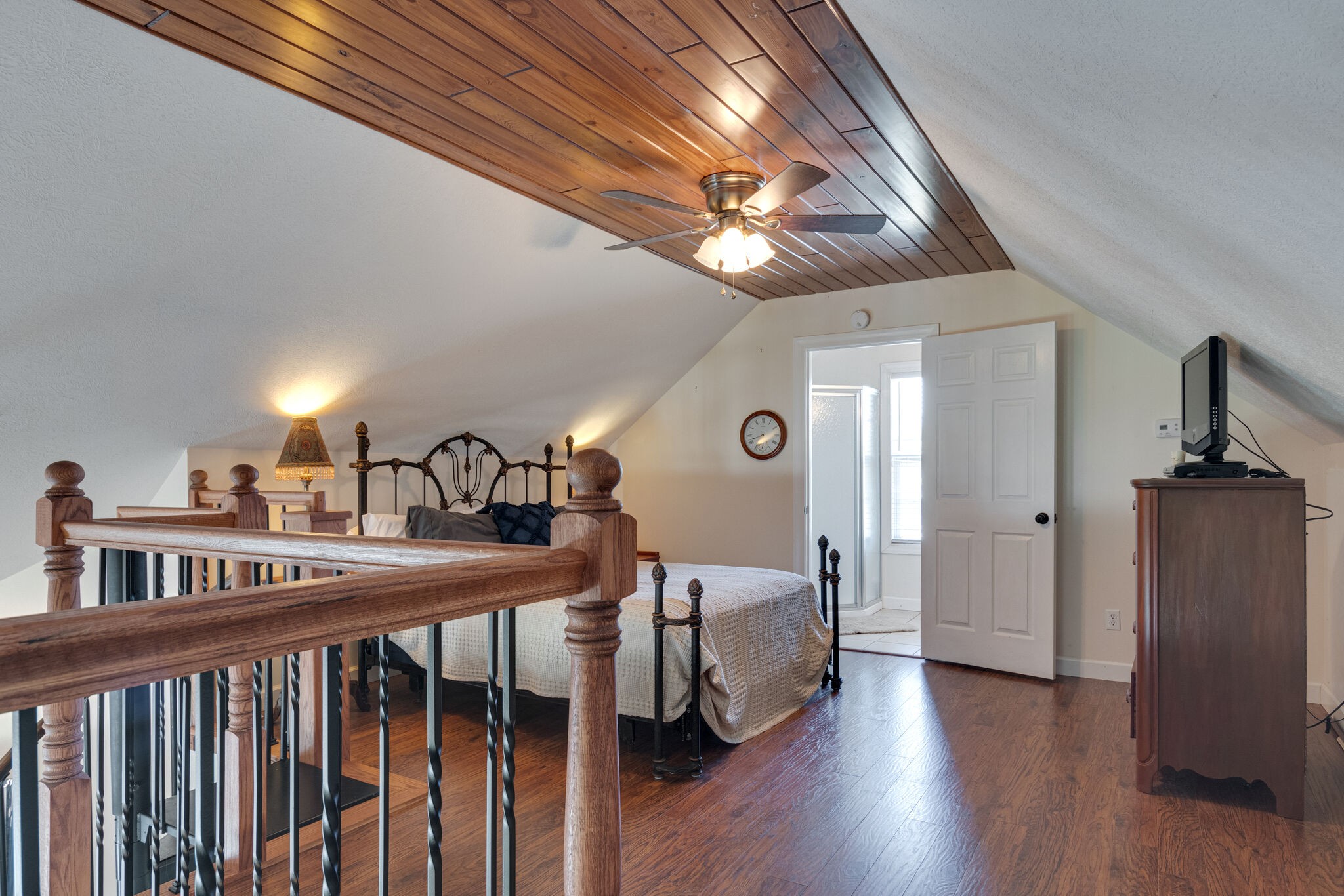 752 Pevahouse Camp Lane Decaturville, TN 38329 - Photo 22 of 47 a view of a livingroom with furniture and hardwood floor