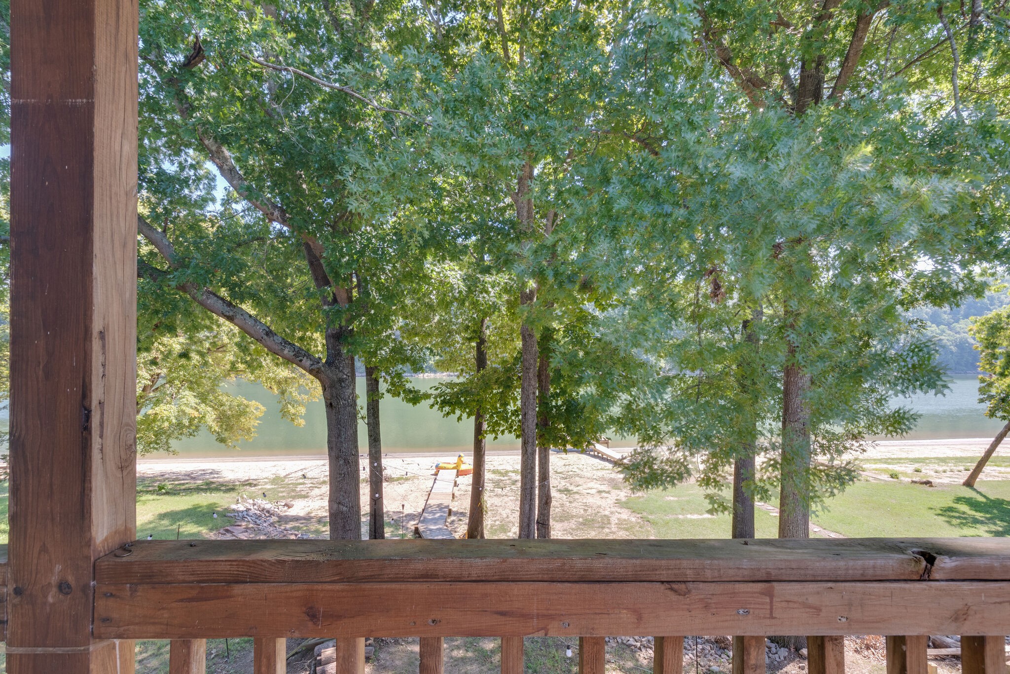 752 Pevahouse Camp Lane Decaturville, TN 38329 - Photo 31 of 47 a view of backyard with large trees
