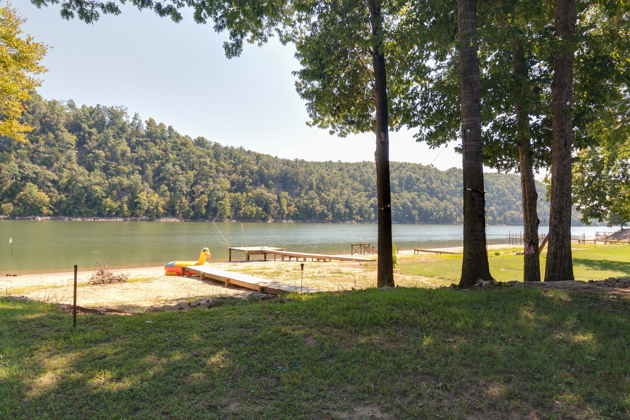 752 Pevahouse Camp Lane Decaturville, TN 38329 - Photo 34 of 47 a view of a lake with a large trees