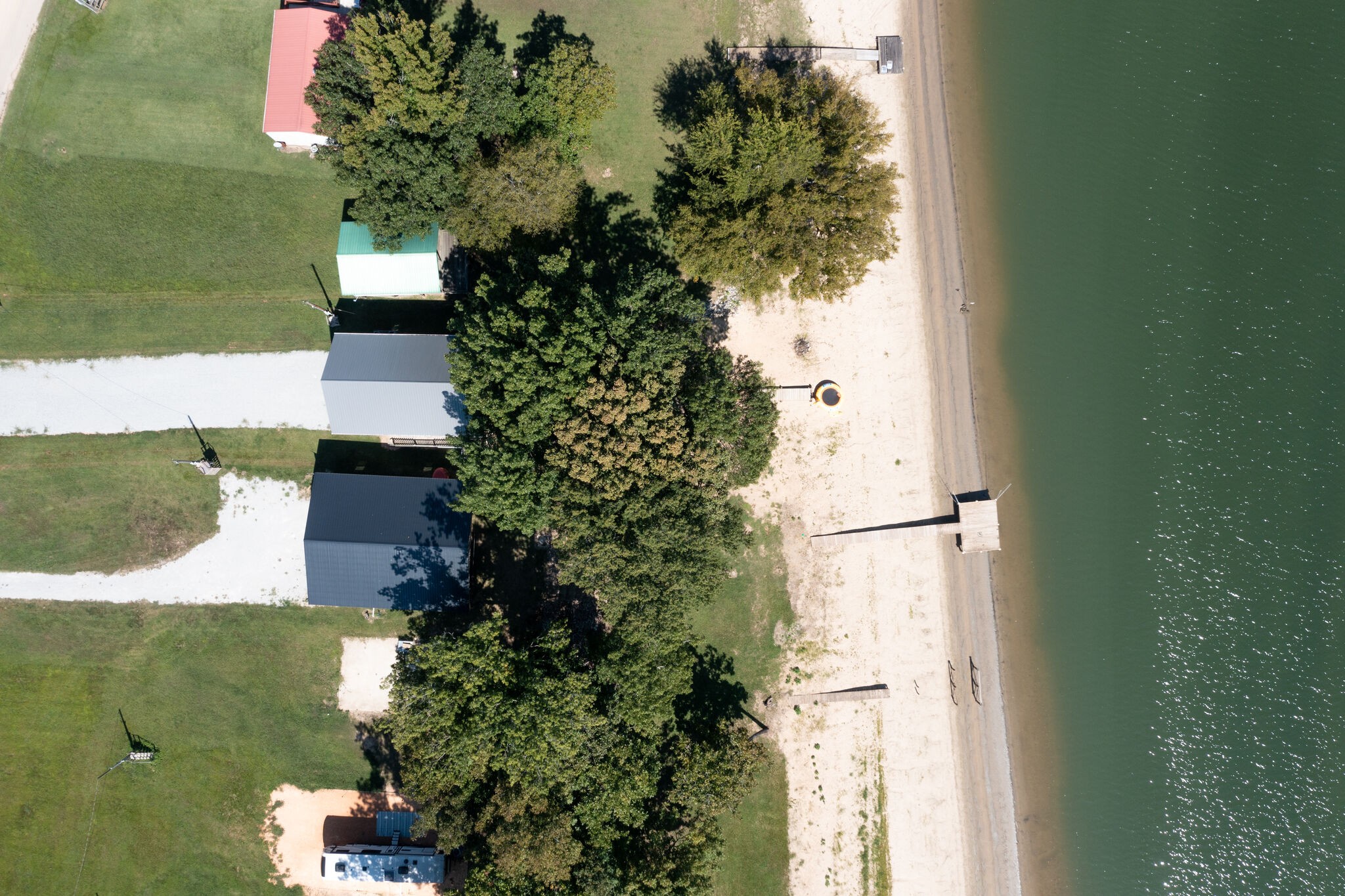 752 Pevahouse Camp Lane Decaturville, TN 38329 - Photo 40 of 47 an aerial view of a house with a yard
