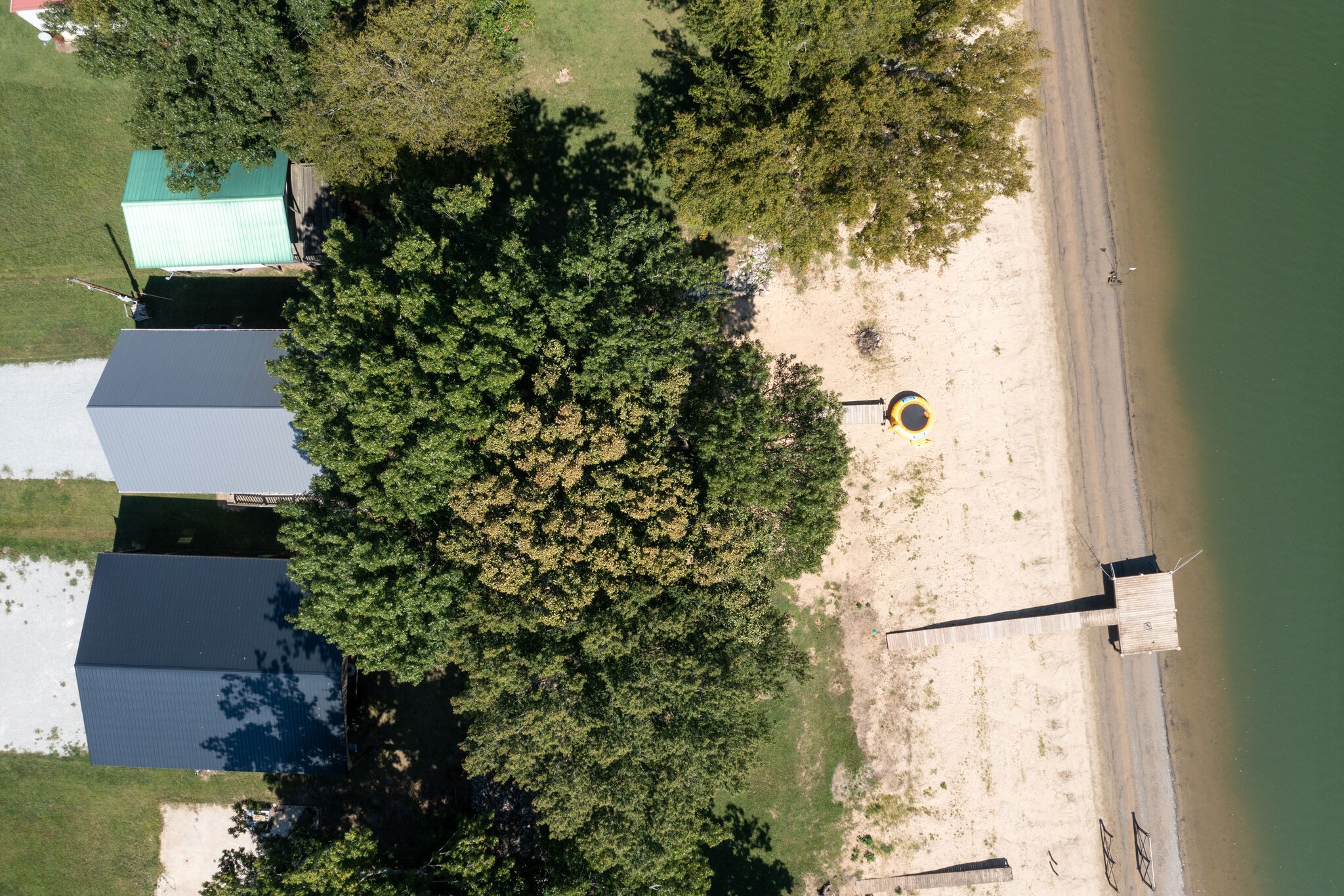 752 Pevahouse Camp Lane Decaturville, TN 38329 - Photo 41 of 47 an aerial view of a house with a yard