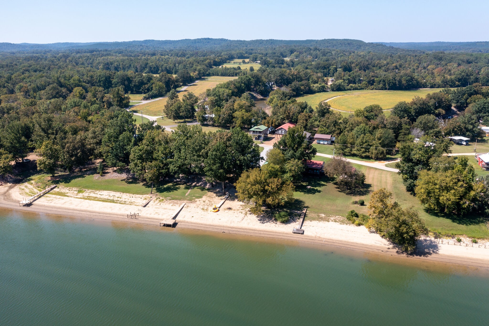 752 Pevahouse Camp Lane Decaturville, TN 38329 - Photo 42 of 47 an aerial view of residential house with outdoor space and lake view