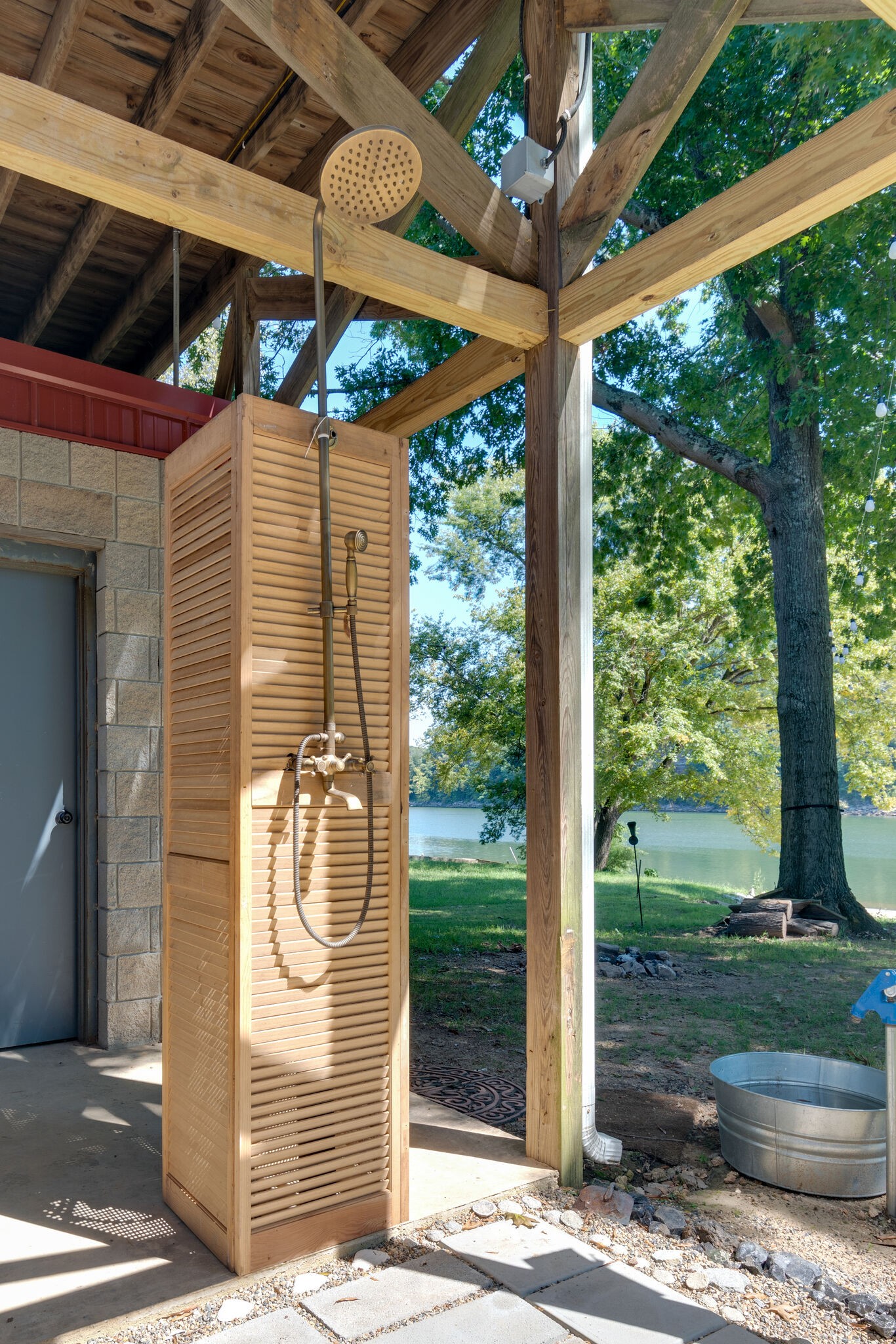 752 Pevahouse Camp Lane Decaturville, TN 38329 - Photo 7 of 47 a backyard of a house with garden and outdoor seating