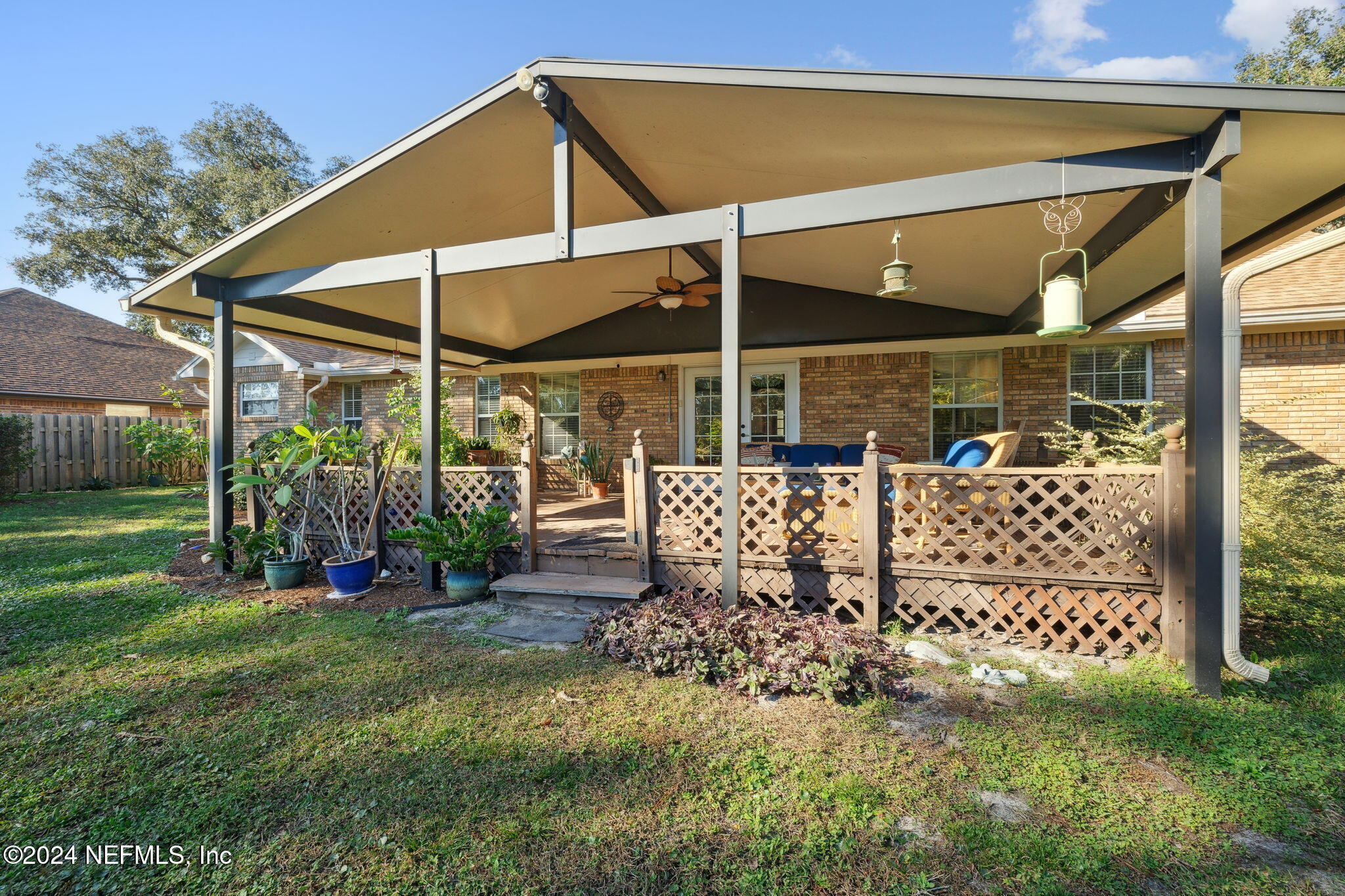 13883 Athens Drive Jacksonville, FL 32223 - Photo 36 of 55 Covered Deck View looking from the lake