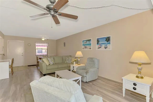 a kitchen with cabinets stainless steel appliances and a counter space