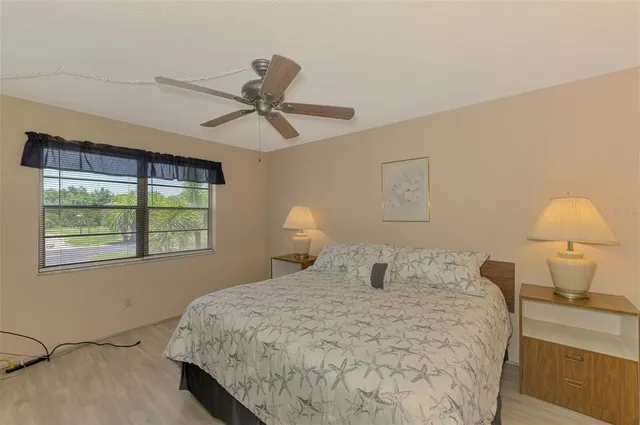 a bedroom with a bed and a cabinets