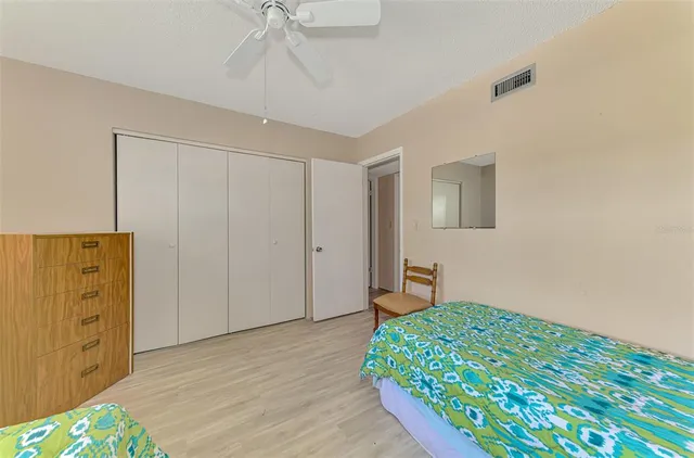 a view of storage and utility room with washer and dryer