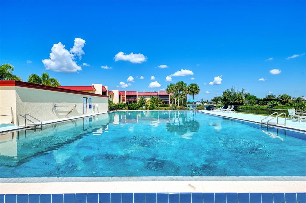 96 Boundary Boulevard, Unit 127 Rotonda West, FL 33947 - Photo 28 of 47 a view of a backyard