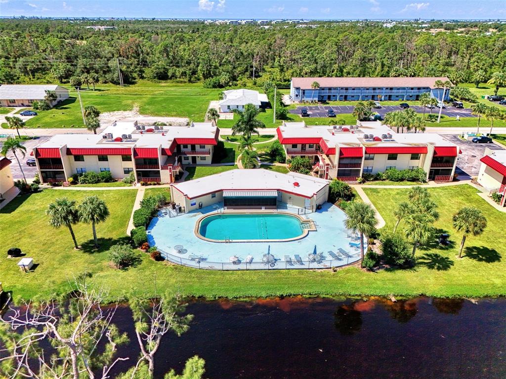 96 Boundary Boulevard, Unit 127 Rotonda West, FL 33947 - Photo 37 of 47 a view of an outdoor sitting area