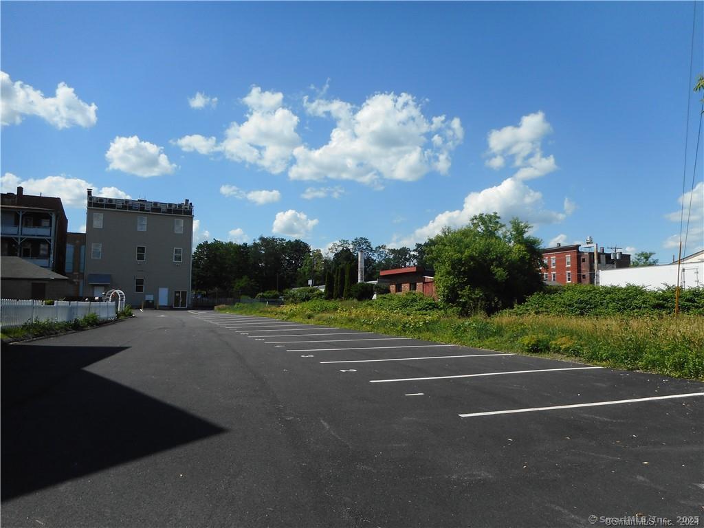 120 East Main Street, Unit 6 Torrington, CT 06790 - Photo 11 of 12 a night view of a house with a yard