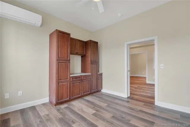 wooden floor and cabinet in a room
