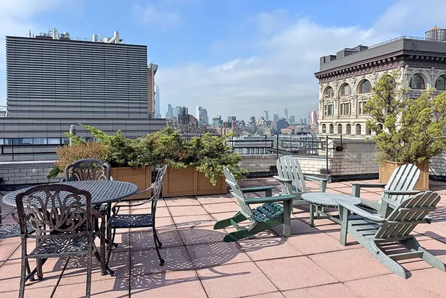 a bathroom with a toilet sink and shower
