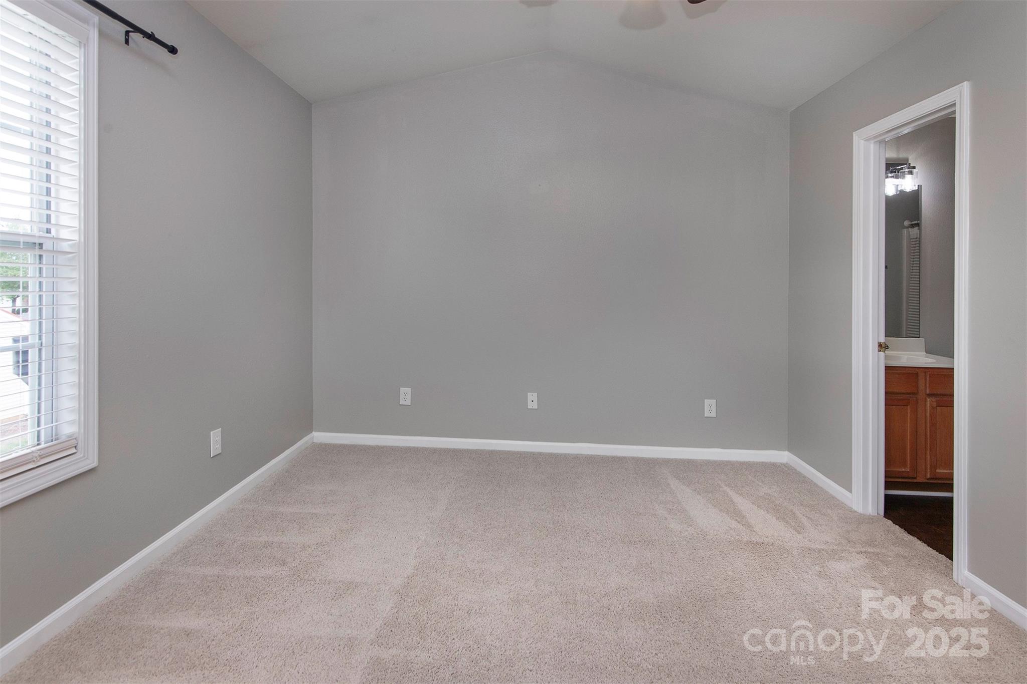 6310 Rhodins Lane Fort Mill, SC 29707 - Photo 16 of 22 an empty room with windows and closet