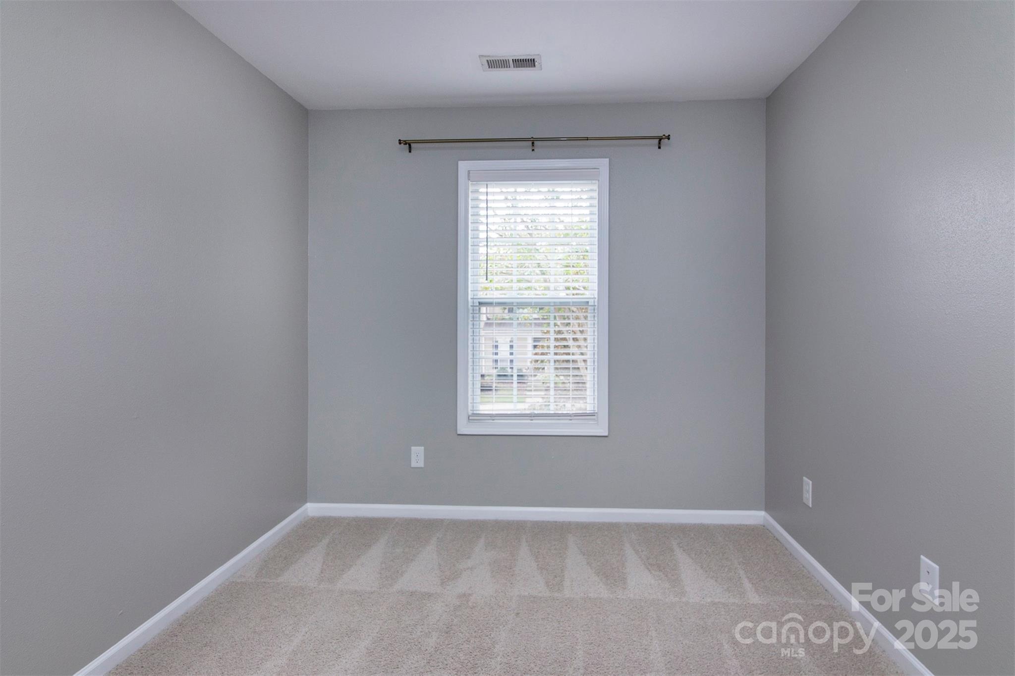 6310 Rhodins Lane Fort Mill, SC 29707 - Photo 18 of 22 an empty room with a window