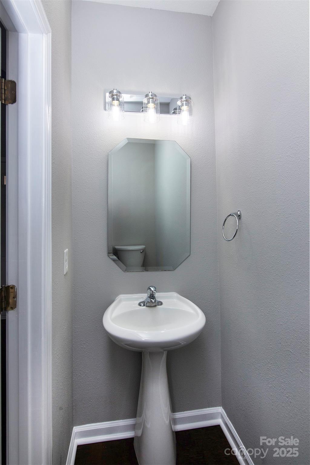 6310 Rhodins Lane Fort Mill, SC 29707 - Photo 21 of 22 a bathroom with a sink and mirror