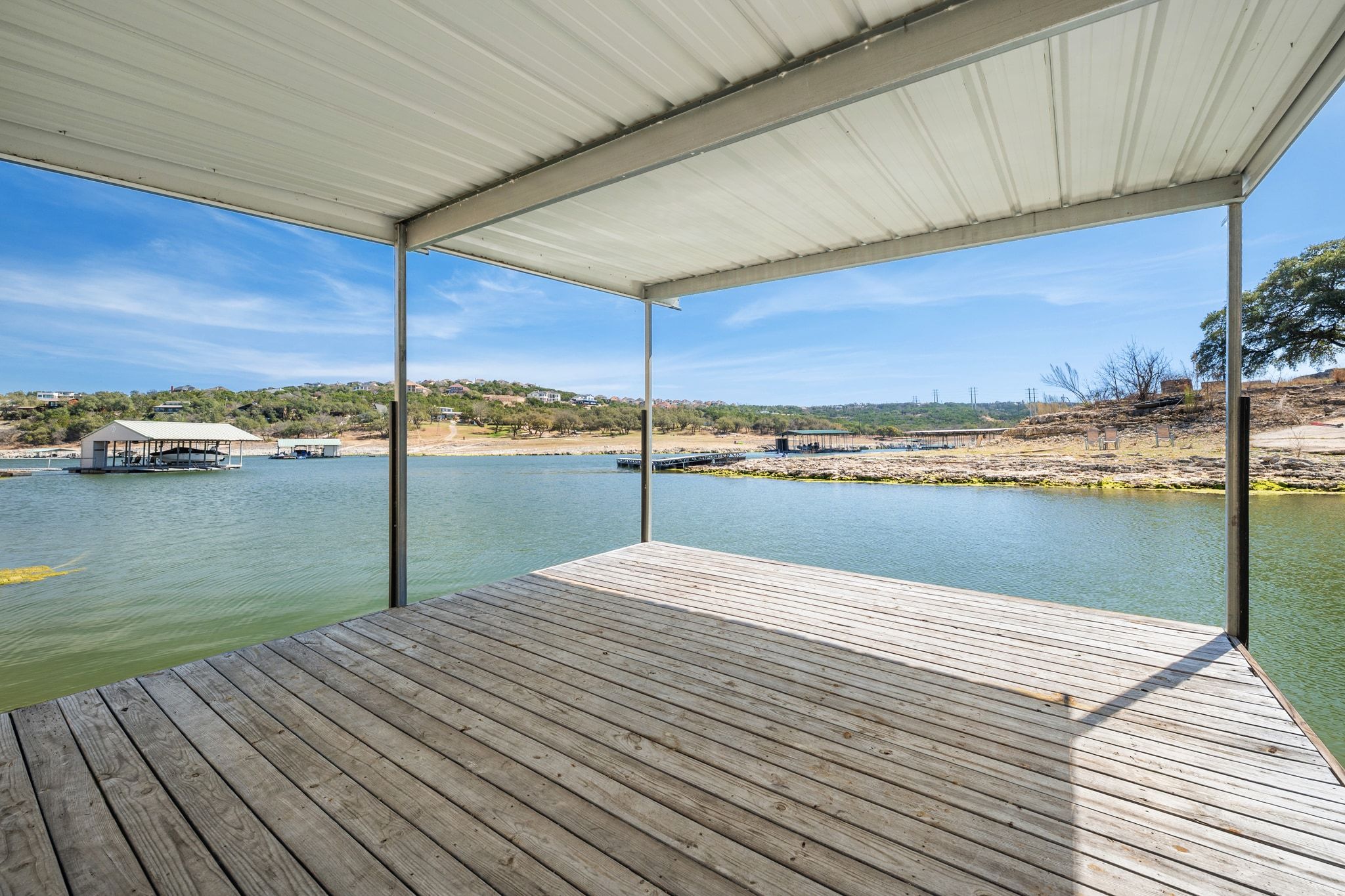 2903 Oak Ridge Drive Spicewood, TX 78669 - Photo 2 of 33 Floating Boat Dock on Lake Travis, with a Main House + Guest Housejust outside of Lakeway, in Spicewood.
