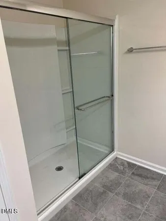 a bathroom with a glass shower