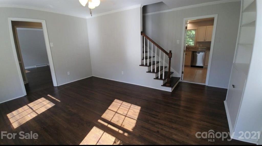 6517 Park Road Charlotte, NC 28210 - Photo 10 of 20 a view of entryway and hall with wooden floor