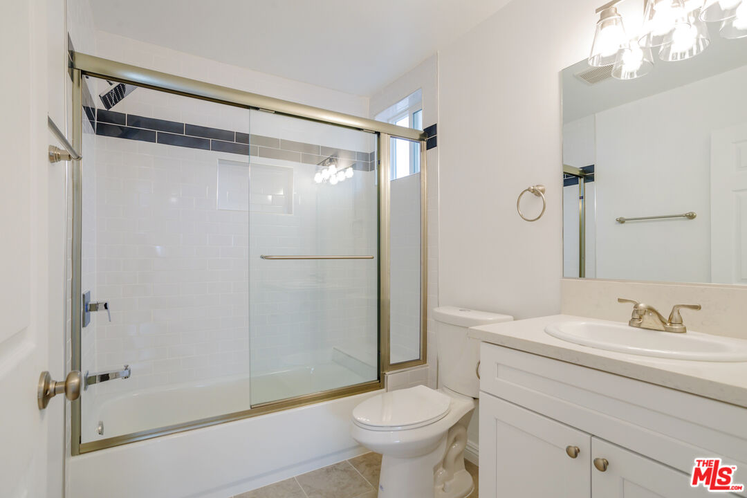 1789 1/2 Atchison Street Pasadena, CA 91104 - Photo 20 of 21 a bathroom with a sink toilet and shower