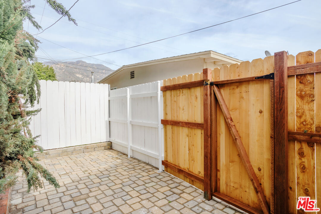 1789 1/2 Atchison Street Pasadena, CA 91104 - Photo 8 of 21 a view of a house with a backyard