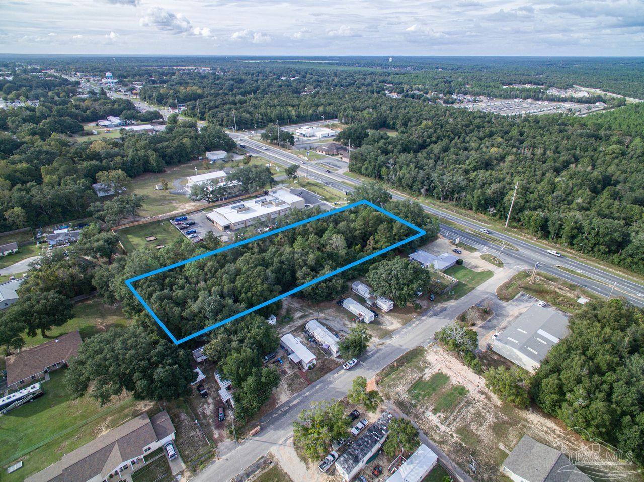 5321 Highway 90 Pace, FL 32571 - Photo 3 of 7 a view of a city with a mountain