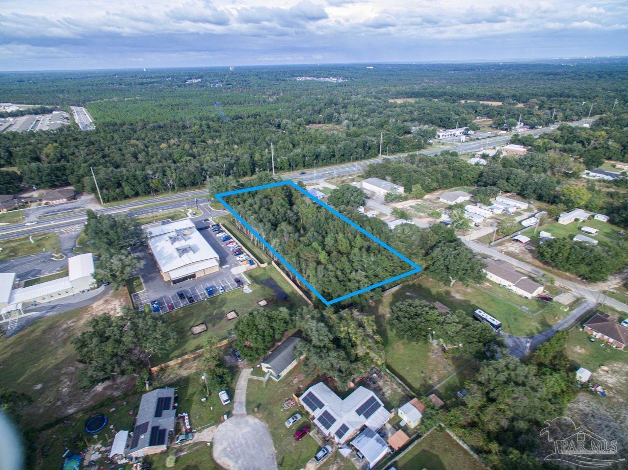 5321 Highway 90 Pace, FL 32571 - Photo 5 of 7 an aerial view of multiple house