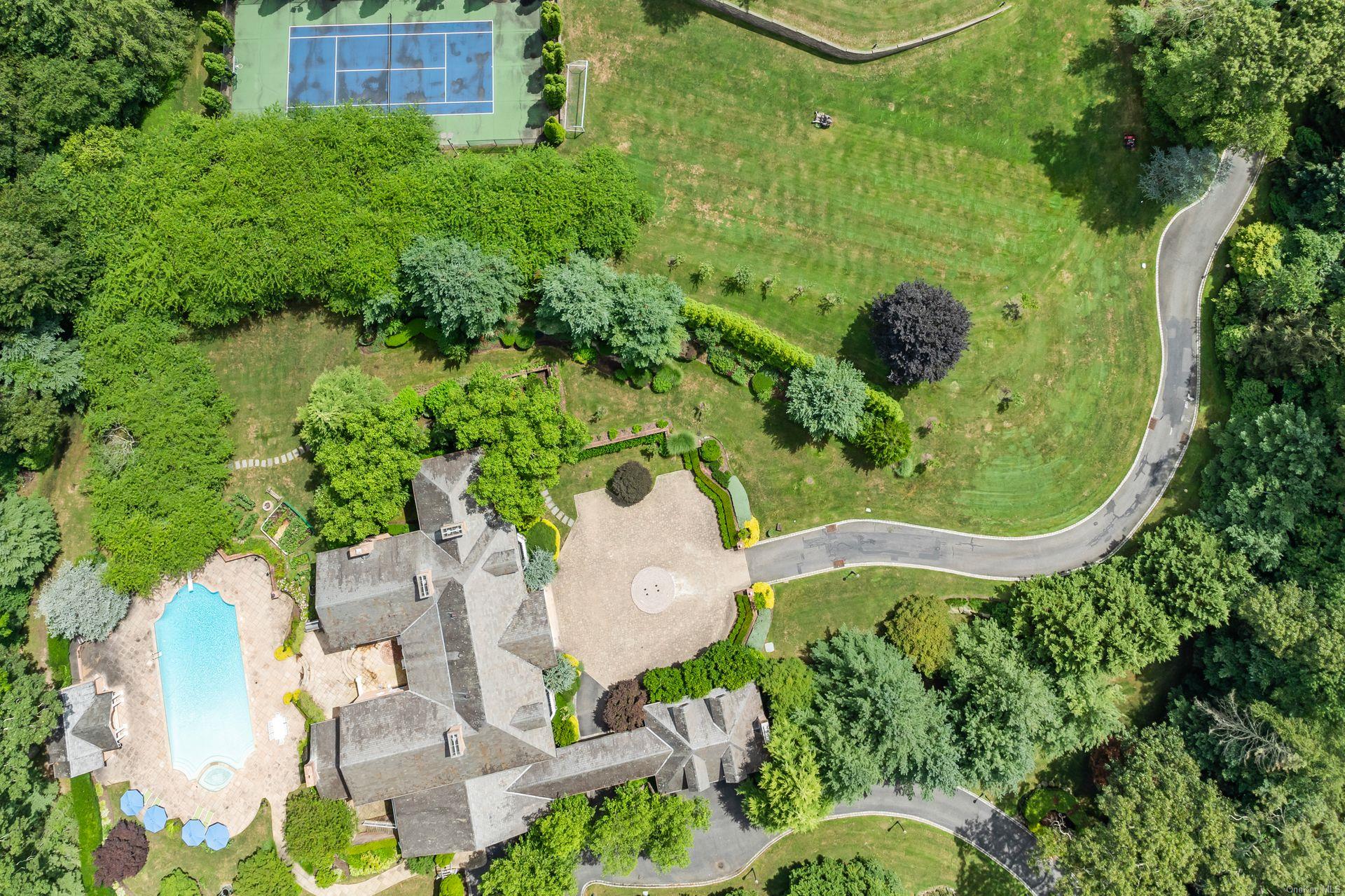 660 Chicken Valley Road Locust Valley, NY 11560 - Photo 47 of 50 an aerial view of a house having outdoor space