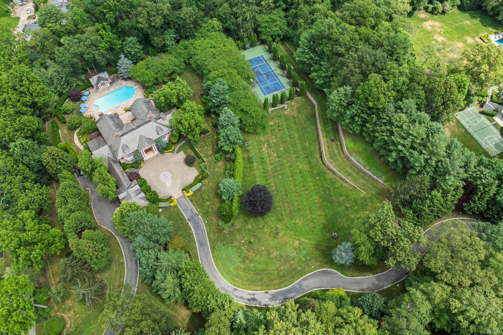 660 Chicken Valley Road Locust Valley, NY 11560 - Photo 49 of 50 an aerial view of a house