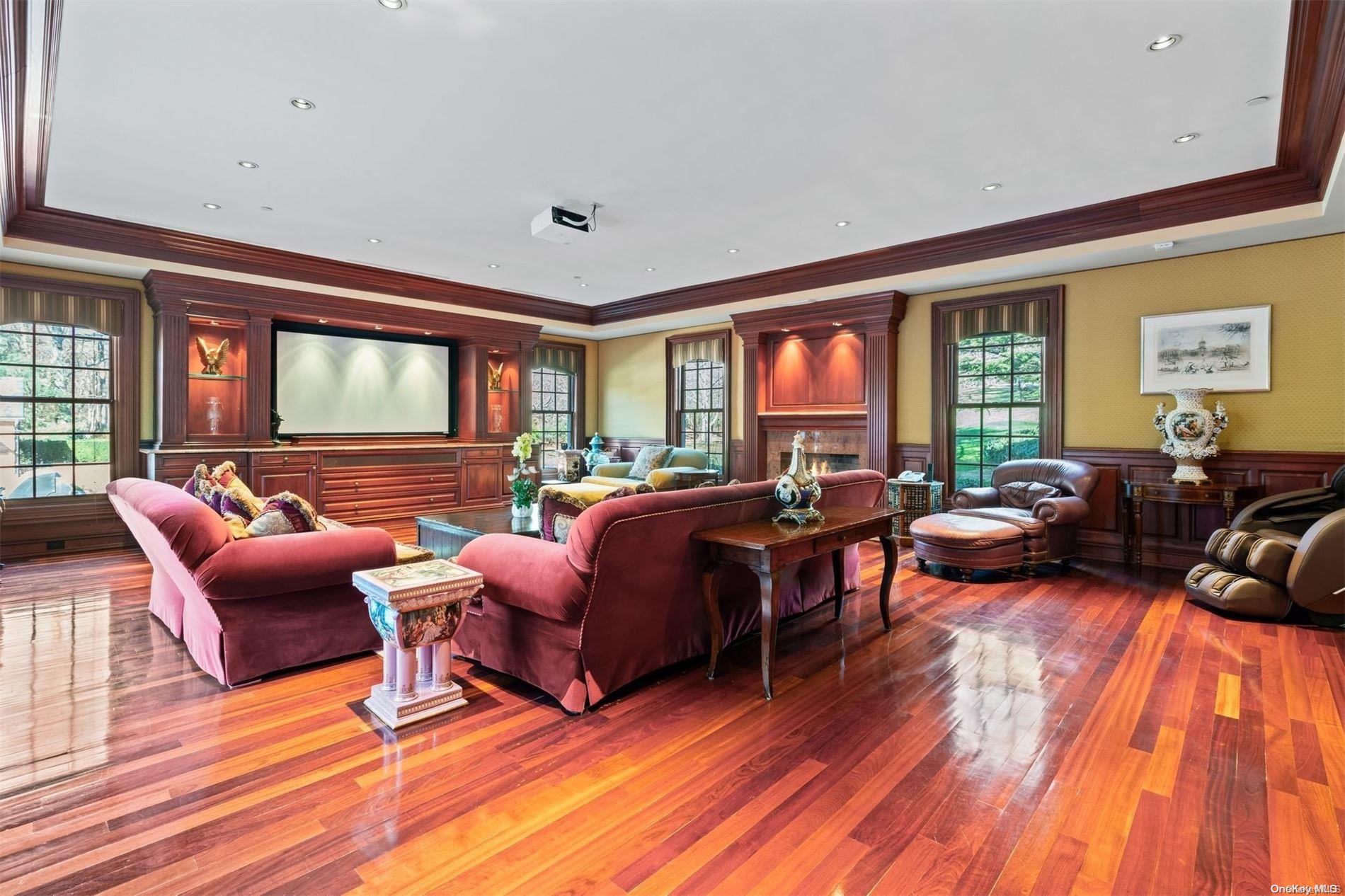 660 Chicken Valley Road Locust Valley, NY 11560 - Photo 9 of 50 a living room with furniture floor to ceiling window and wooden floor