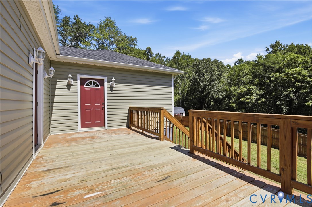 36 Columbia Road Cartersville, VA 23027 - Photo 27 of 35 Spacious outdoor deck with wood railings and steps