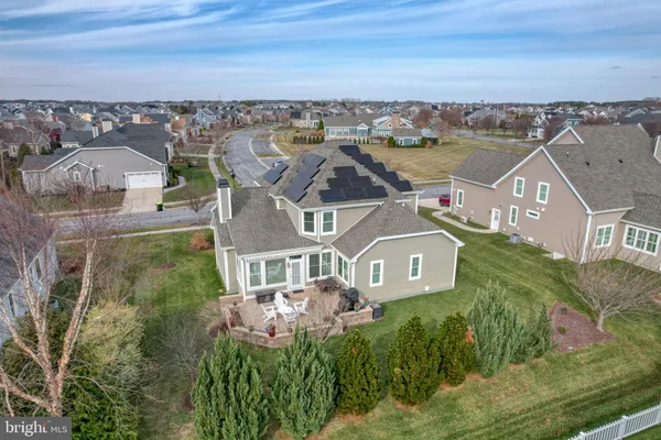 an aerial view of a house with a garden