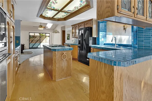 a view of a kitchen with furniture and a fireplace