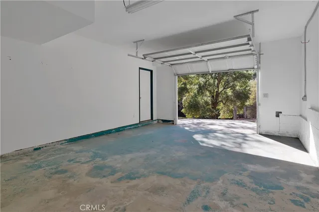 a view of a big room with large windows