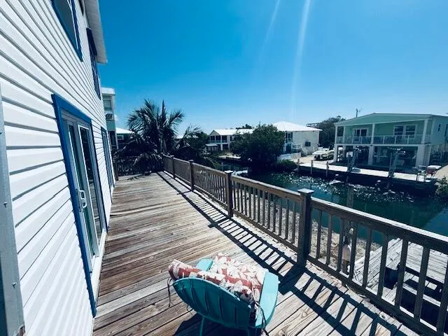 a terrace of a house with outdoor seating
