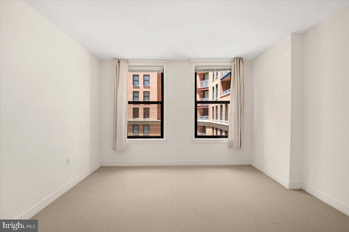 616 E Street Northwest, Unit 455 Washington, DC 20004 - Photo 19 of 75 3/4 Windows Offer Streaming Light Through Home