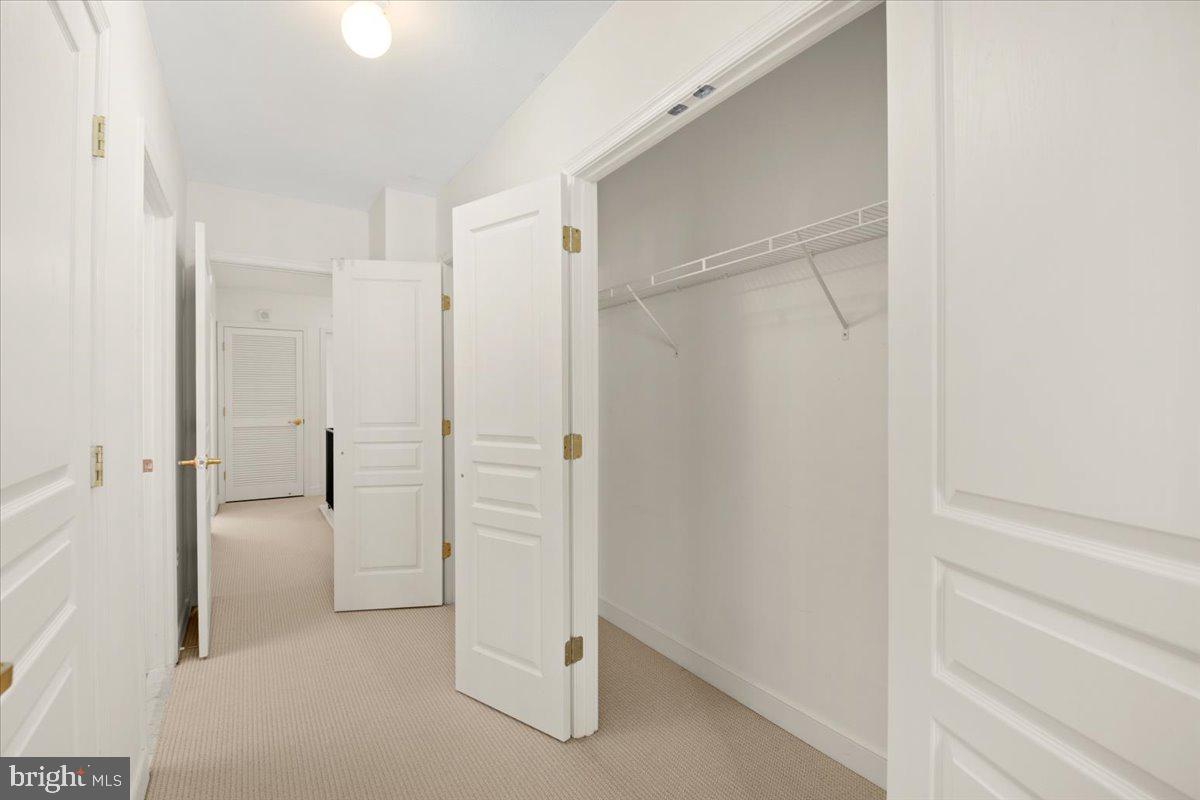 616 E Street Northwest, Unit 455 Washington, DC 20004 - Photo 21 of 75 Multiple Walk-in Closets leading to Master Bedroom