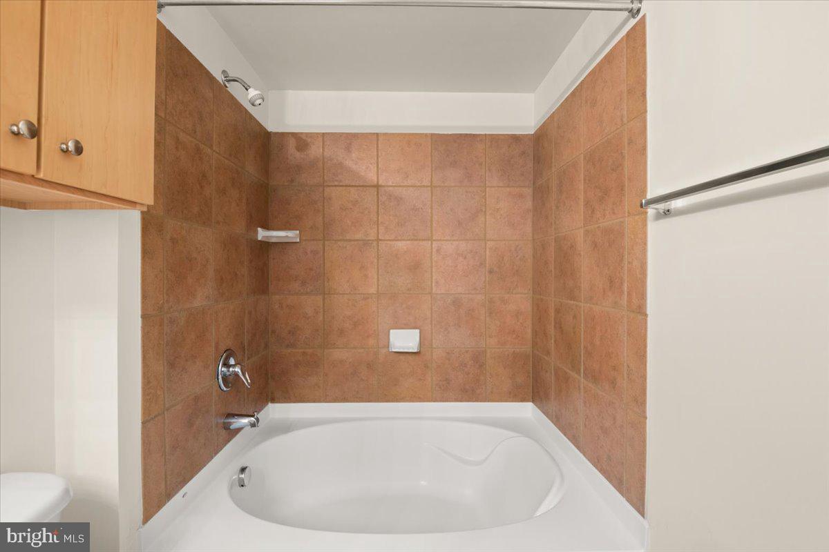 616 E Street Northwest, Unit 455 Washington, DC 20004 - Photo 26 of 75 Both Bathrooms feature Storage and Spa Tubs