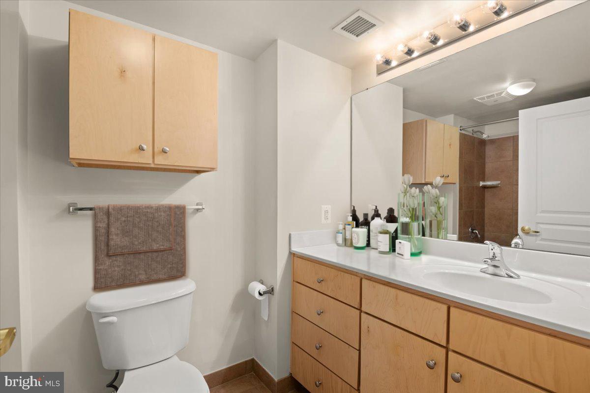 616 E Street Northwest, Unit 455 Washington, DC 20004 - Photo 30 of 75 2nd Bathroom with Soaking Tub and Storage Closets