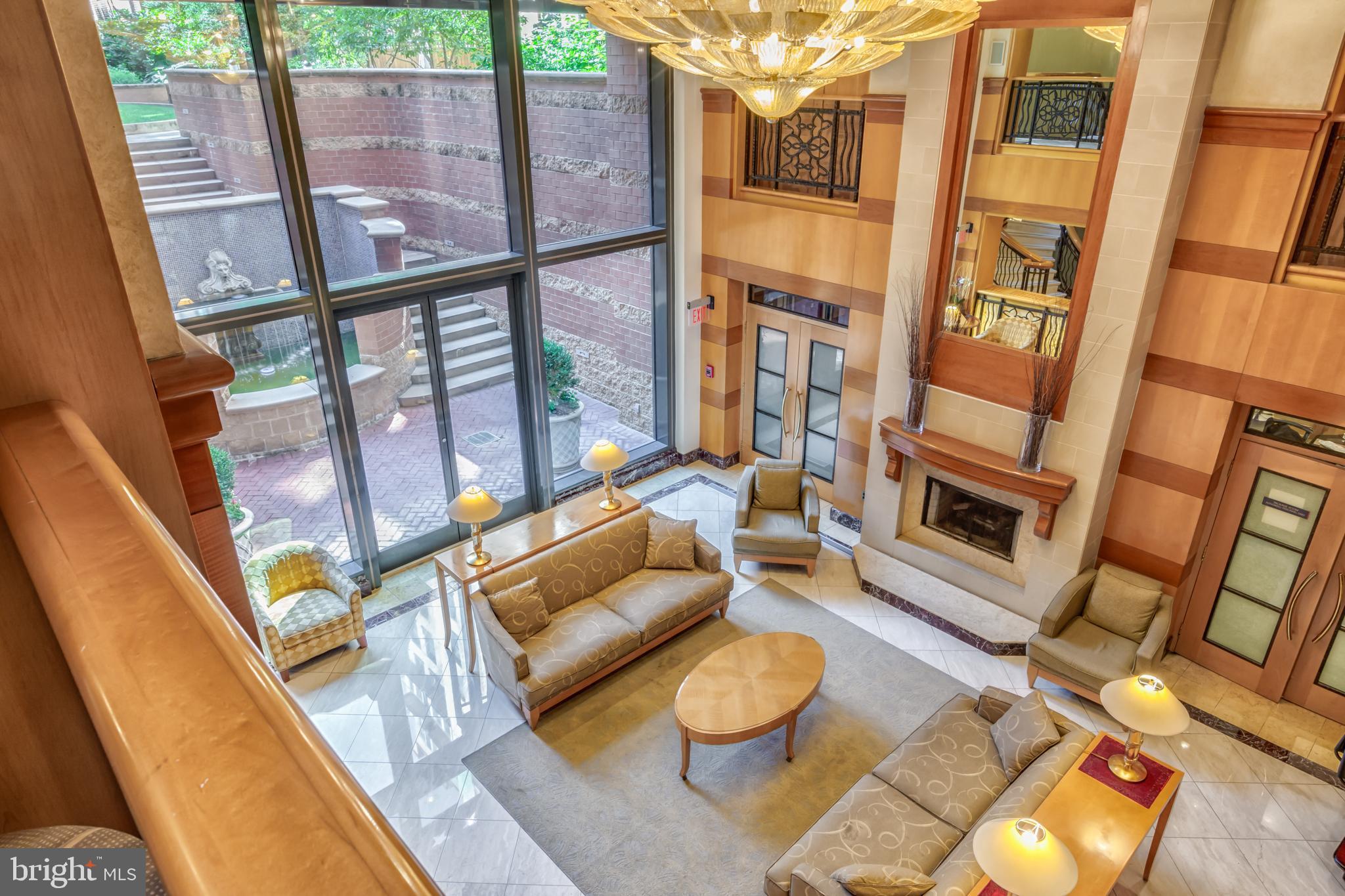 616 E Street Northwest, Unit 455 Washington, DC 20004 - Photo 38 of 75 Elegant Lobby w/ 24hr Concierge and Package Coll'n