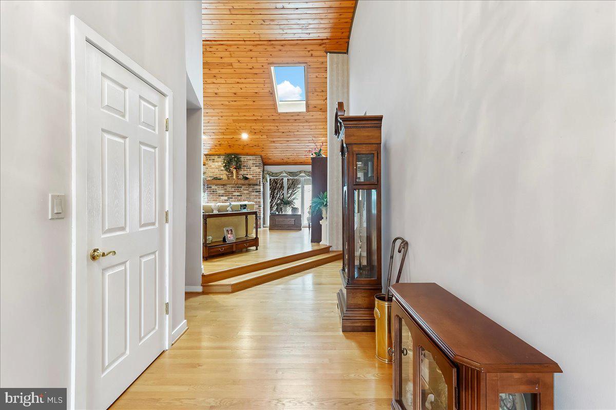 531 Chandler Mill Road Kennett Square, PA 19348 - Photo 14 of 60 a view of a hallway with wooden floor and staircase